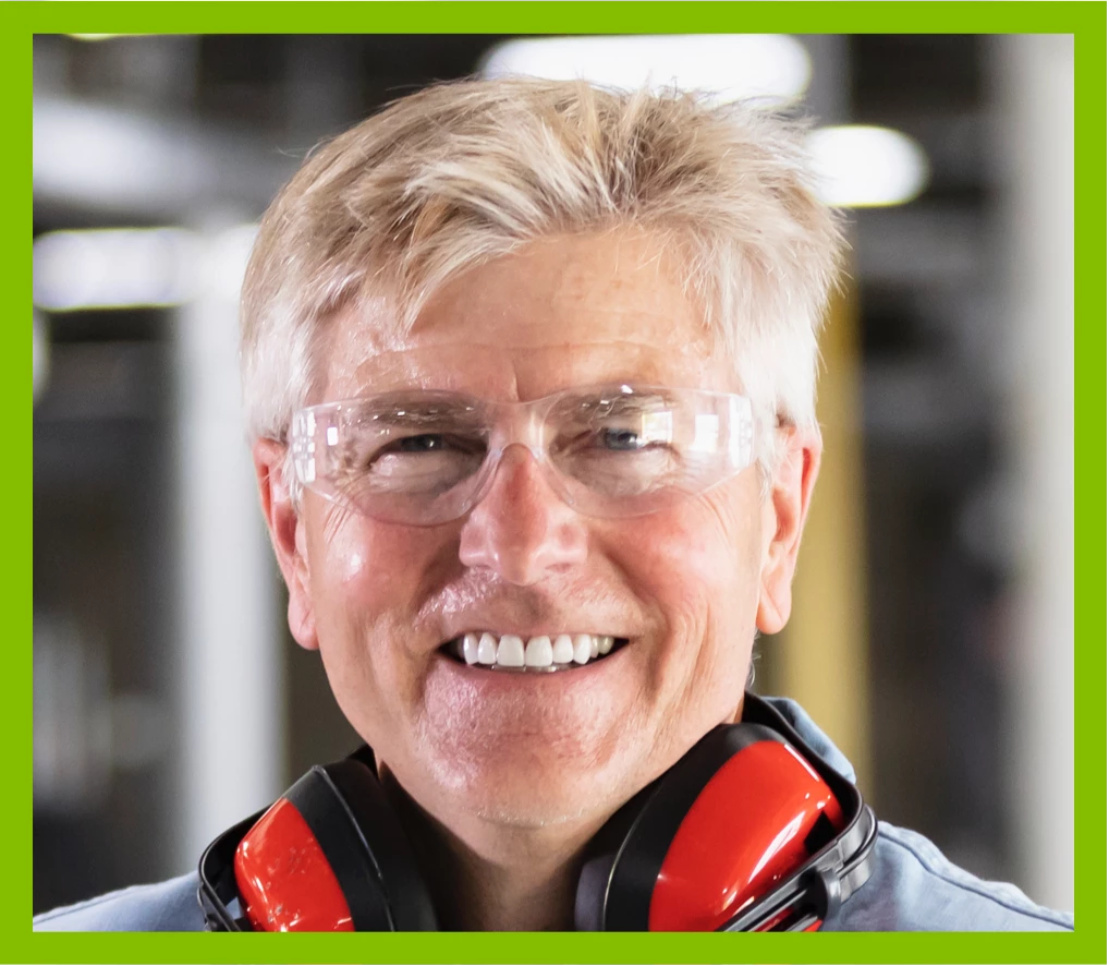 small business owner standing in his shop